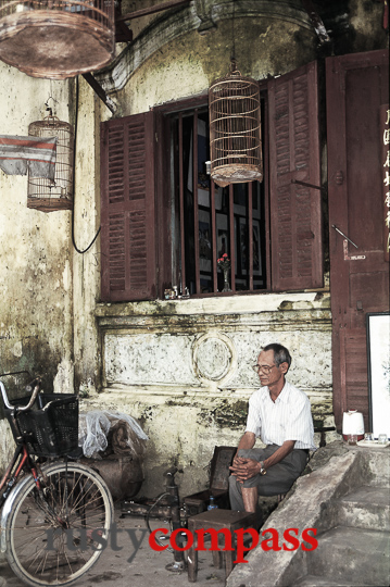 This shot was taken back in the mid 90s when this man had a small motorcycle and bicycle repair shop on Hoi An's Nguyen Thai Hoc St.